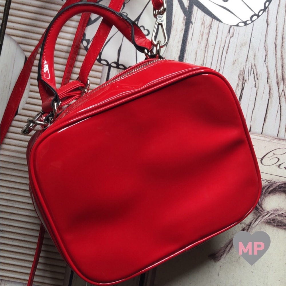 Red faux leather shoulder/hand bag